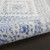 5' X 7' Ivory And Blue Geometric Area Rug
