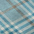 8' Teal Ivory And Gray Plaid Washable Round Rug With UV Protection 8' Teal Ivory And Gray Plaid Washable Round Rug With UV Protection