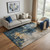 5' X 8' Blue Gold And Silver Abstract Washable Area Rug With UV Protection 5' X 8' Blue Gold And Silver Abstract Washable Area Rug With UV Protection