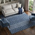 10' X 14' Navy Blue And Ivory Tribal Washable Area Rug With UV Protection