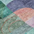 10' X 14' Green Purple And Blue Abstract Washable Indoor Outdoor Area Rug 10' X 14' Green Purple And Blue Abstract Washable Indoor Outdoor Area Rug