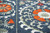 6' X 8' Blue Orange And Gray Tribal Washable Area Rug With UV Protection 6' X 8' Blue Orange And Gray Tribal Washable Area Rug With UV Protection