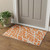 3' X 5' Orange And Ivory Abstract Washable Area Rug With UV Protection 3' X 5' Orange And Ivory Abstract Washable Area Rug With UV Protection