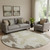 8' Chocolate Beige And Taupe Abstract Washable Round Rug With UV Protection