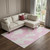 9' X 12' Pink And Ivory Abstract Washable Area Rug With UV Protection 9' X 12' Pink And Ivory Abstract Washable Area Rug With UV Protection
