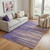 5' X 8' Purple Orange And Ivory Striped Washable Area Rug With UV Protection 5' X 8' Purple Orange And Ivory Striped Washable Area Rug With UV Protection
