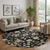 8' Black Ivory And Beige Floral Washable Round Rug With UV Protection 8' Black Ivory And Beige Floral Washable Round Rug With UV Protection