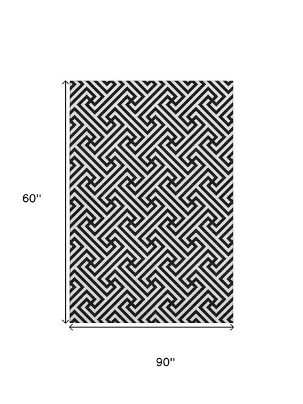 5' X 8' Black And Ivory Geometric Washable Area Rug With UV Protection