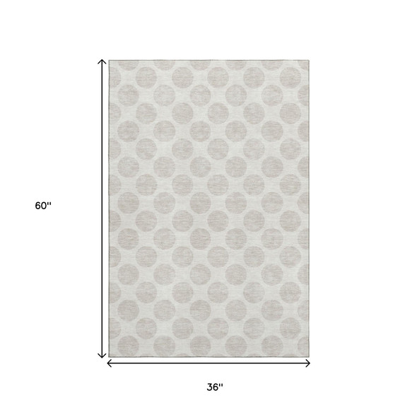 3' X 5' Ivory And Beige Polka Dot Washable Area Rug With UV Protection