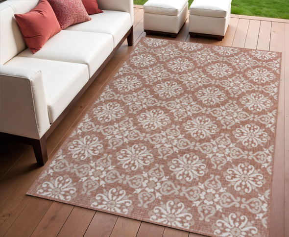 4' X 6' Salmon And Cream Floral Indoor Outdoor Area Rug