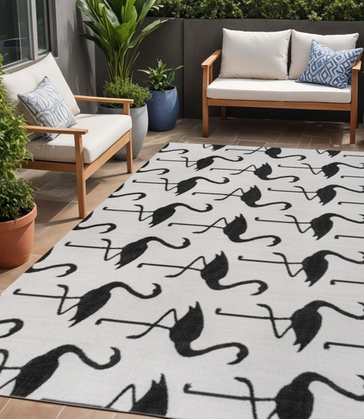 5' X 8' White And Black Animal Print Indoor Outdoor Area Rug