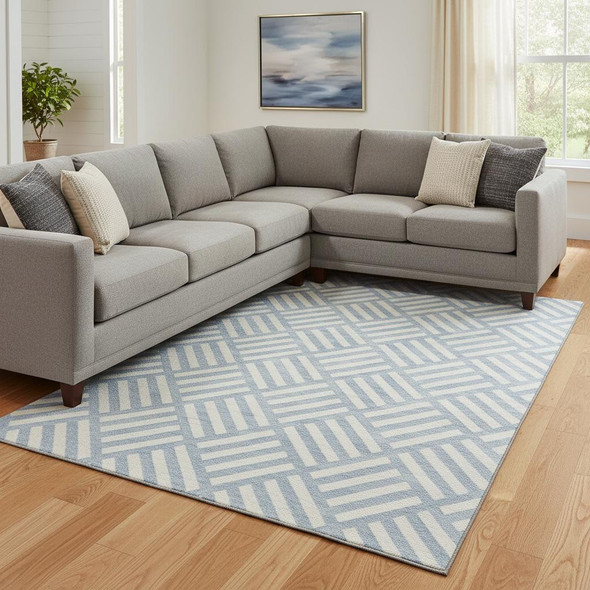 9' X 12' Sky Blue And Ivory Geometric Washable Area Rug With UV Protection