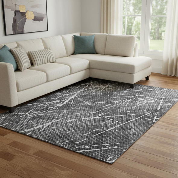 10' X 14' Charcoal And Ivory Abstract Washable Area Rug With UV Protection