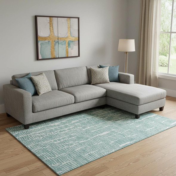 10' X 14' Teal And Ivory Vermicular Washable Area Rug With UV Protection