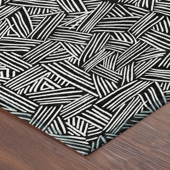 8' Black And Ivory Round Geometric Washable Indoor Outdoor Area Rug