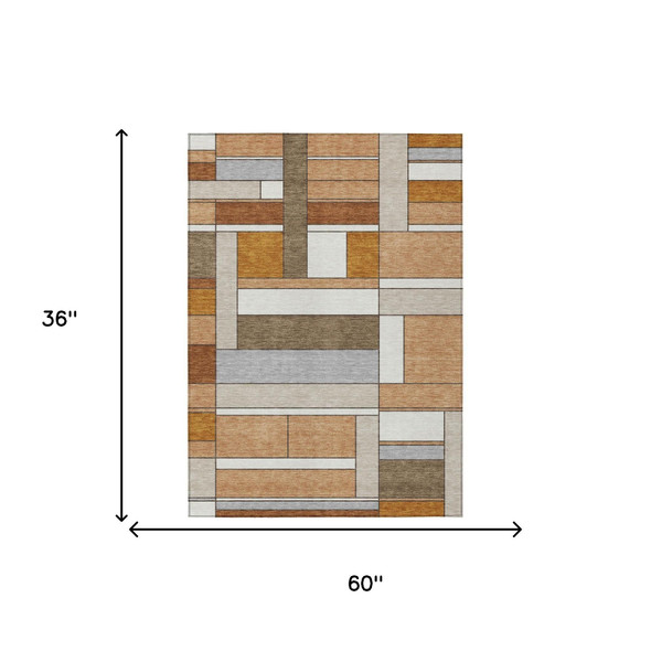 3' X 5' Copper And Orange Geometric Washable Indoor Outdoor Area Rug