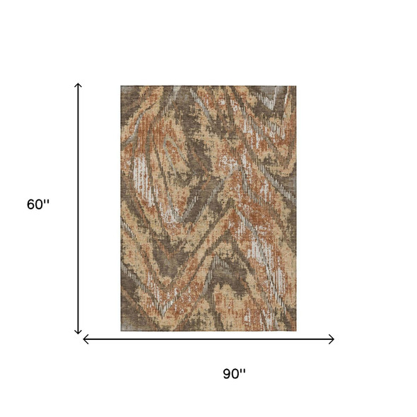 5' X 8' Orange And Brown Abstract Washable Indoor Outdoor Area Rug