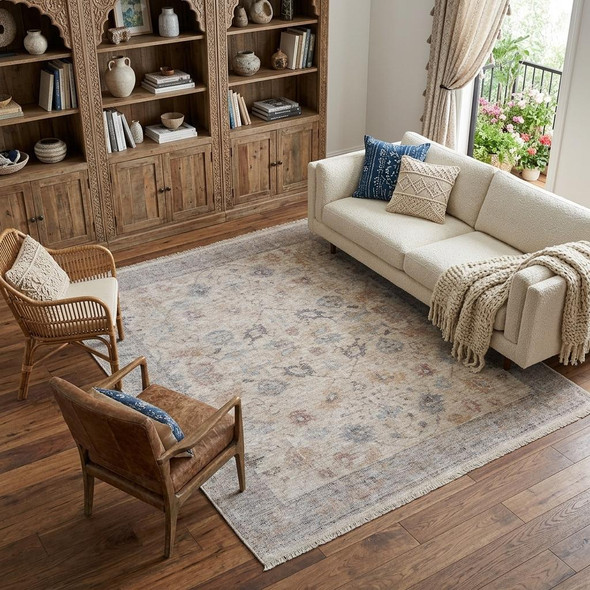 10' X 14' Ivory Tan and Blue Floral Hand Woven Distressed Area Rug With Fringe