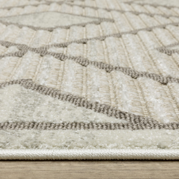 7' X 10' Beige And Brown Geometric Area Rug