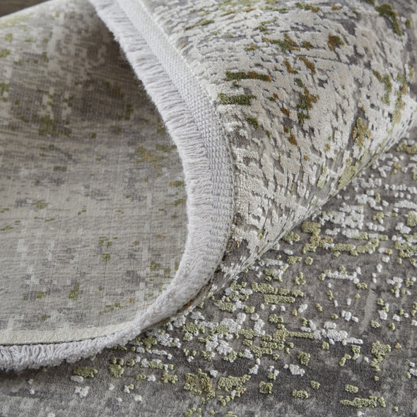 5' X 8' Green Gray And Ivory Abstract Area Rug With Fringe
