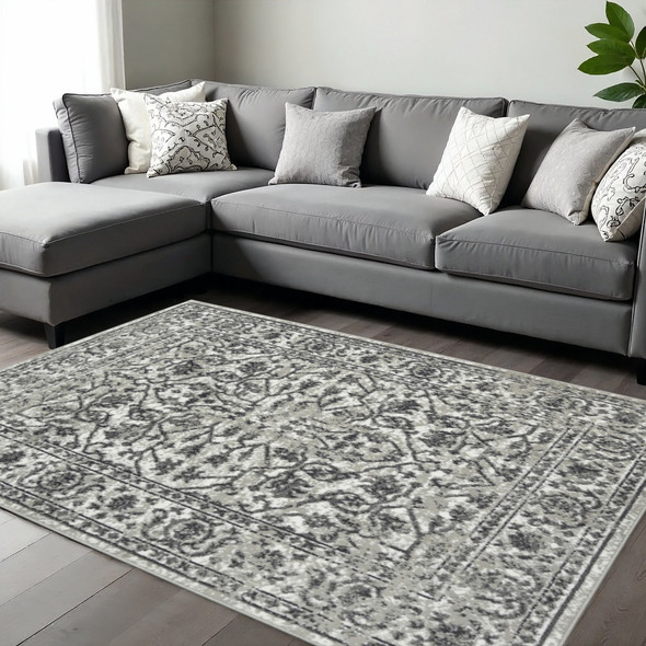 9' X 12' Ivory Gray And Dark Gray Floral Area Rug