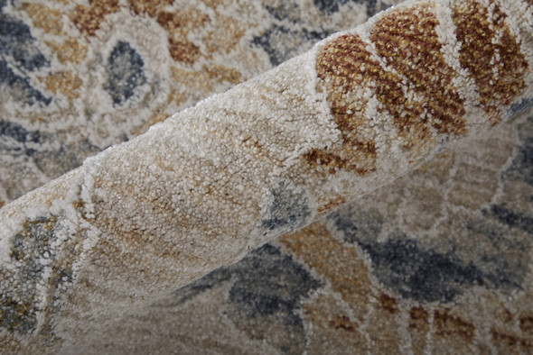 7' X 10' Ivory Taupe and Blue Floral Power Loom Worn Faded Area Rug With Fringe
