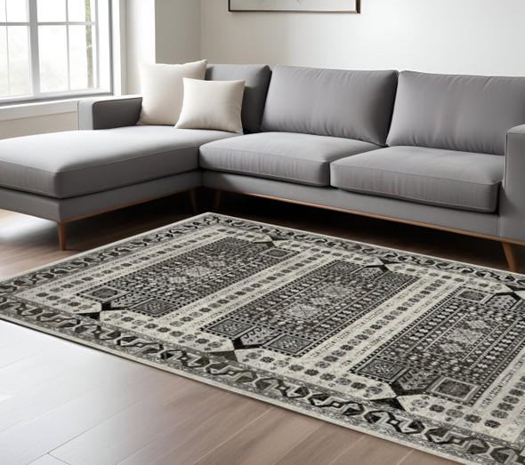 8' X 11' Ivory And Charcoal Oriental Area Rug With Fringe