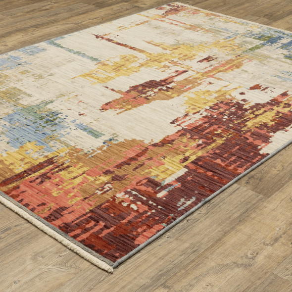 7' X 10' Beige Yellow And Salmon Abstract Area Rug With Fringe