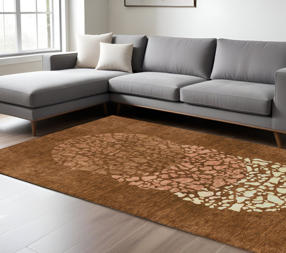 8' X 10' Orange Terra Cotta And Ivory Abstract Washable Indoor Outdoor Area Rug