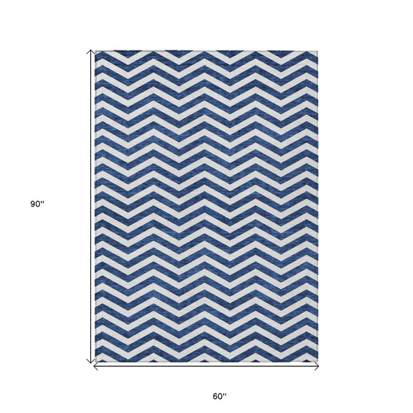 5' X 8' Navy Blue And Ivory Chevron Washable Indoor Outdoor Area Rug