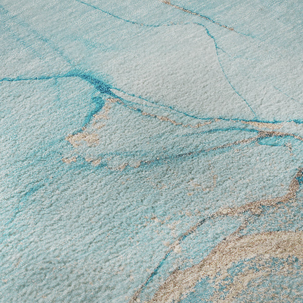 5' X 8' Teal And Ivory Abstract Washable Area Rug With UV Protection