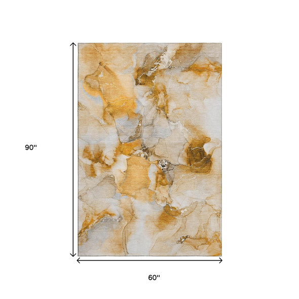 5' X 8' Orange And Ivory Abstract Washable Area Rug With UV Protection