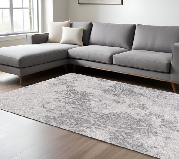 7' X 10' Cream And Gray Tinted Ogee Pattern Area Rug