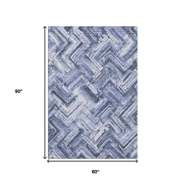 5' X 8' Blue And Ivory Chevron Washable Area Rug With UV Protection