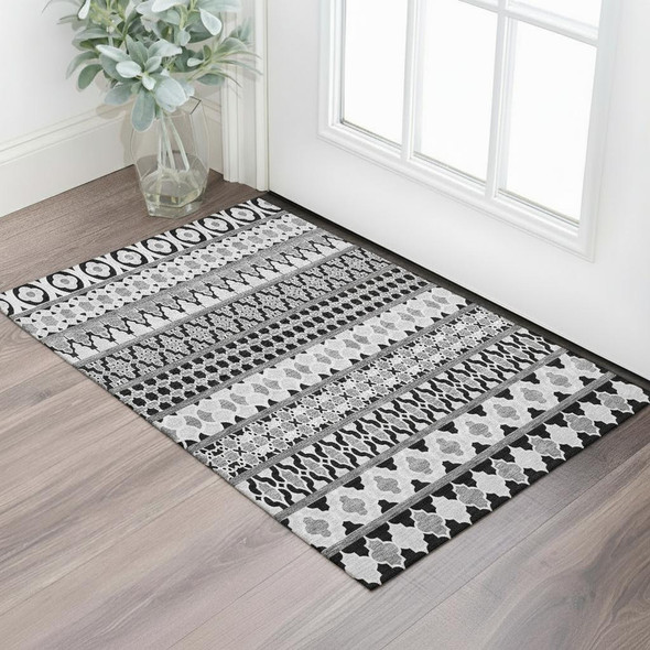 3' X 5' Black And Ivory Ikat Washable Area Rug With UV Protection