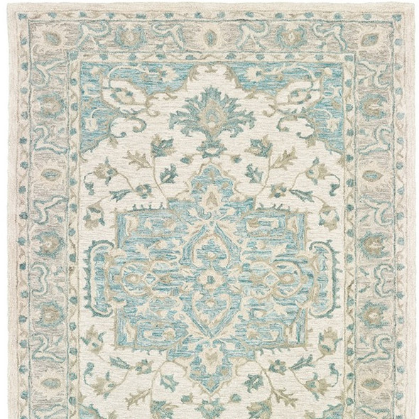 9' X 12' Turquoise and Cream Medallion Area Rug