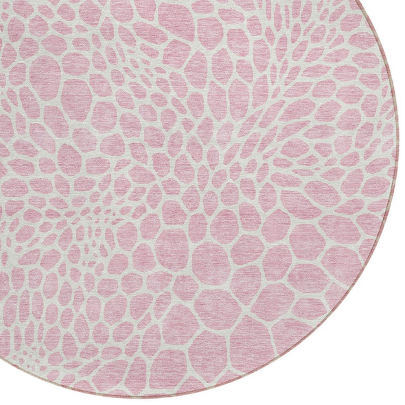 8' Pink And Ivory Round Geometric Washable Indoor Outdoor Area Rug