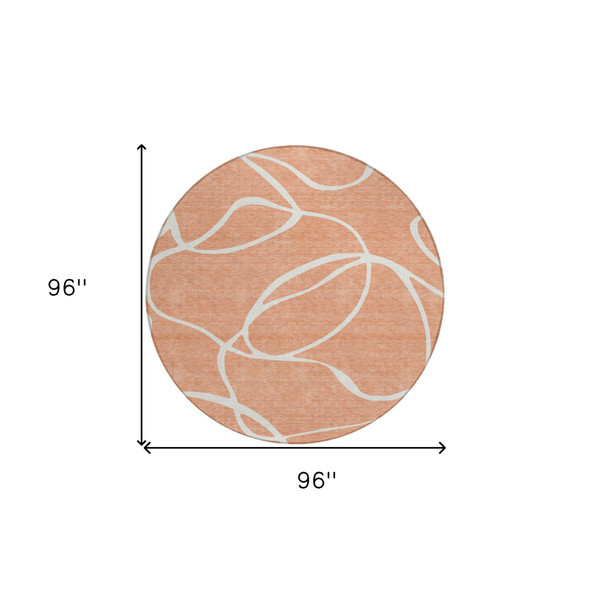 8' Salmon And Ivory Round Abstract Washable Indoor Outdoor Area Rug