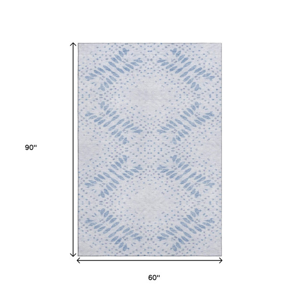 5' X 8' Blue And Ivory Floral Washable Area Rug With UV Protection