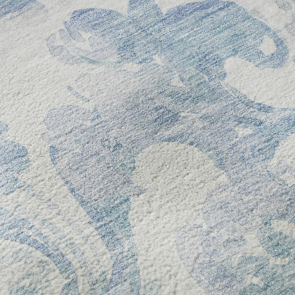 8' Sky Blue And Ivory Paisley Washable Round Rug With UV Protection