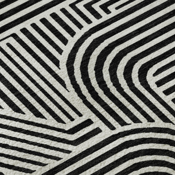 8' Black And Ivory Abstract Geometric Washable Round Rug With UV Protection