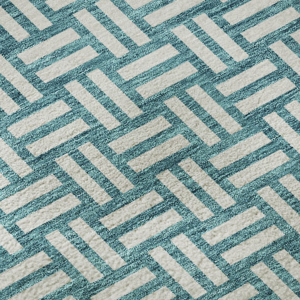 5' X 8' Teal And Ivory Abstract Geometric Washable Area Rug With UV Protection