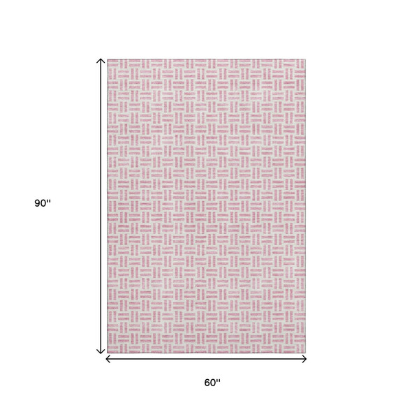 5' X 8' Pink And Ivory Geometric Washable Area Rug With UV Protection