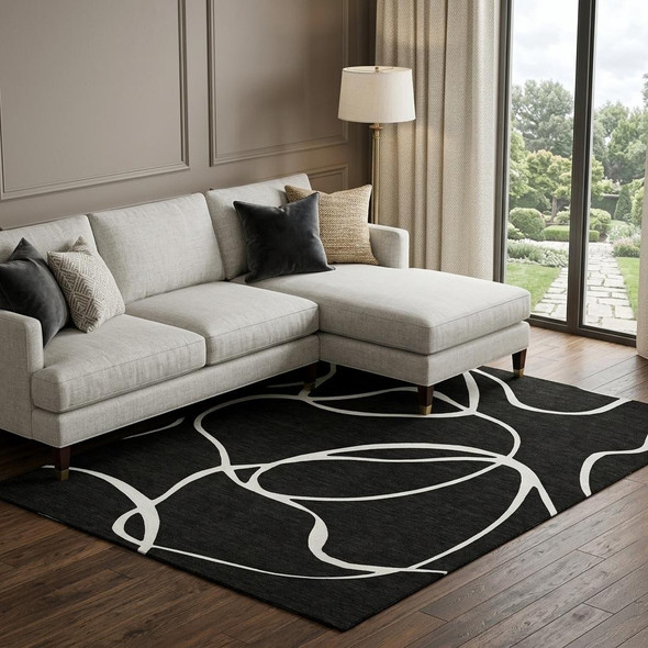 10' X 14' Black And Ivory Abstract Washable Area Rug With UV Protection