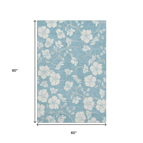 5' X 8' Sky Blue And Ivory Floral Washable Area Rug With UV Protection