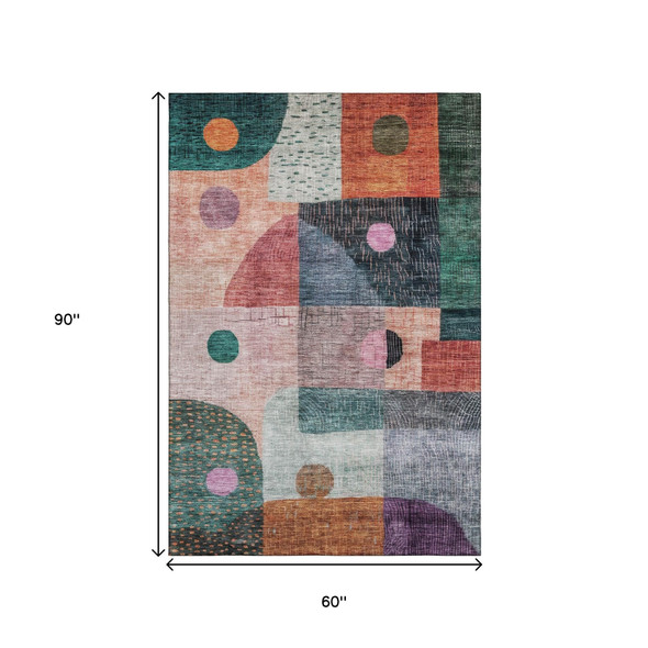 5' X 8' Orange Teal And Purple Geometric Washable Area Rug With UV Protection
