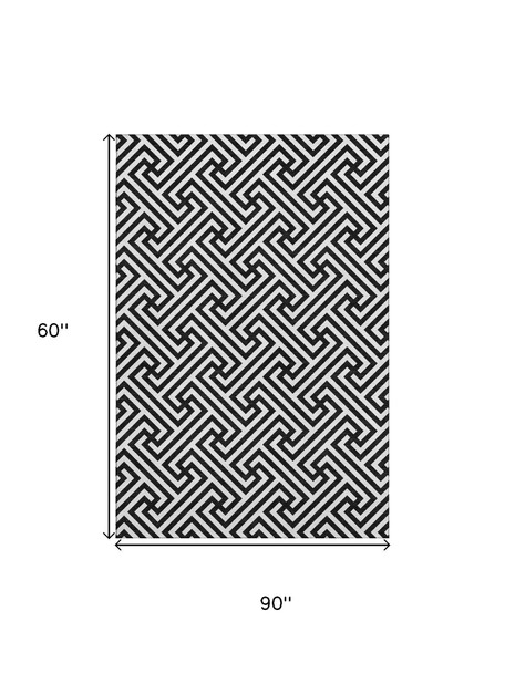 5' X 8' Black And Ivory Geometric Washable Area Rug With UV Protection