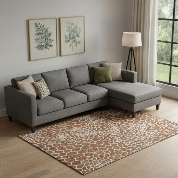 8' X 10' Rust And Ivory Geometric Washable Area Rug With UV Protection