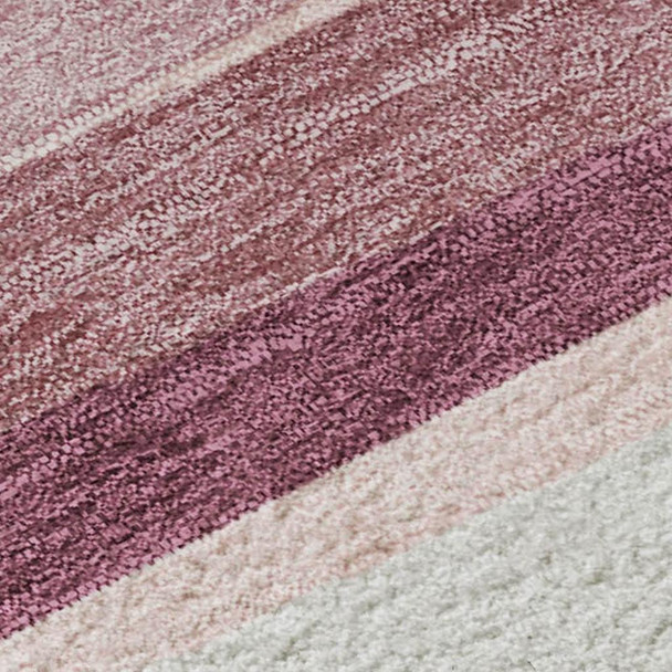 5' X 8' Pink Ivory And Blush Striped Washable Area Rug With UV Protection