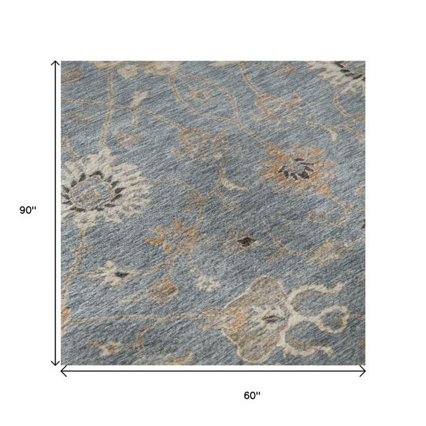 5' X 8' Denim Blue Beige And Copper Floral Washable Area Rug With UV Protection